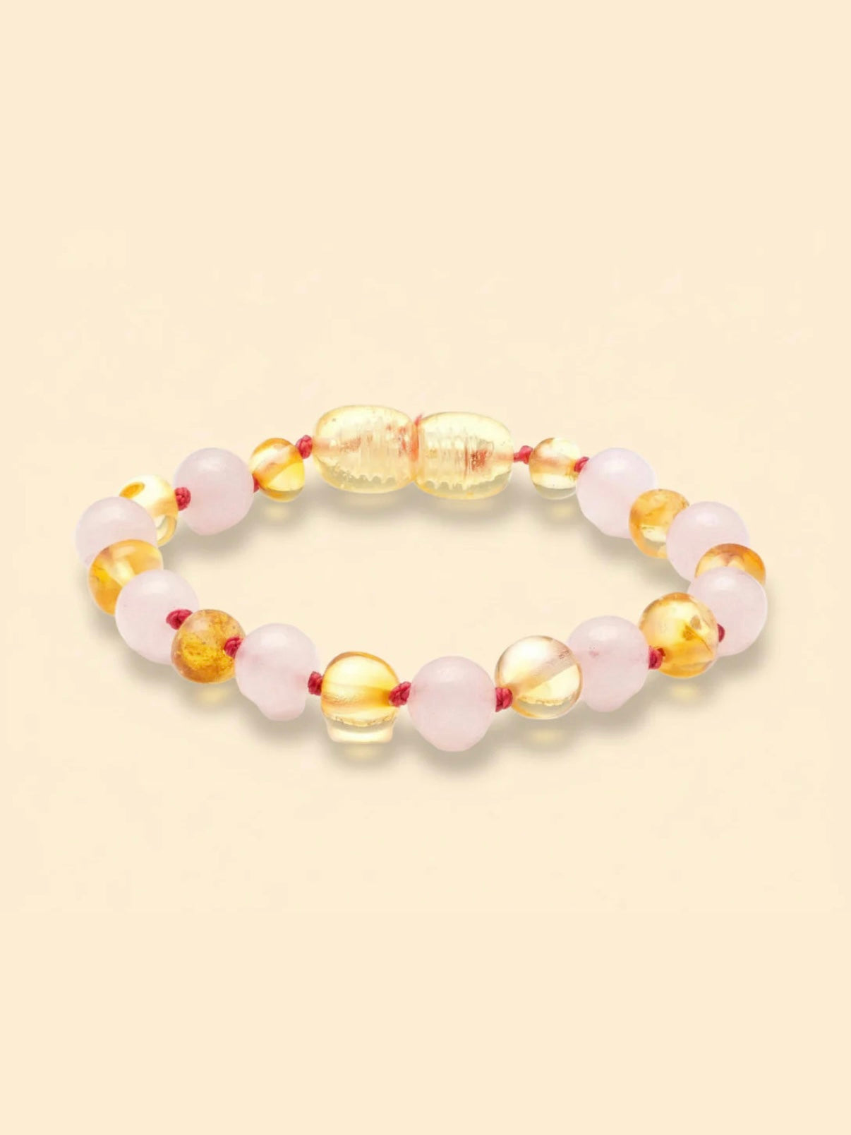 Barnsteenarmband met lemon barnsteen en rozenkwarts voor baby of kind