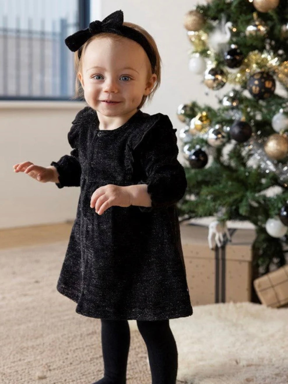 Zwart glitter jurkje voor baby of kind van het merk Feetje