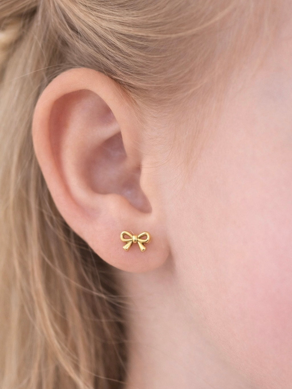 Kinderoorbellen strik goud