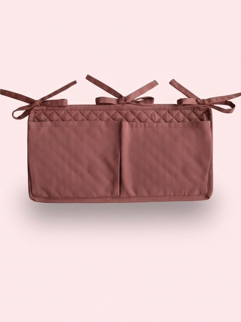 Box opbergzak in cognac kleur van het merk Mushie