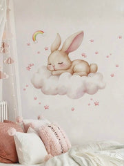 Muursticker van een slapend konijntje als wanddecoratie voor de babykamer