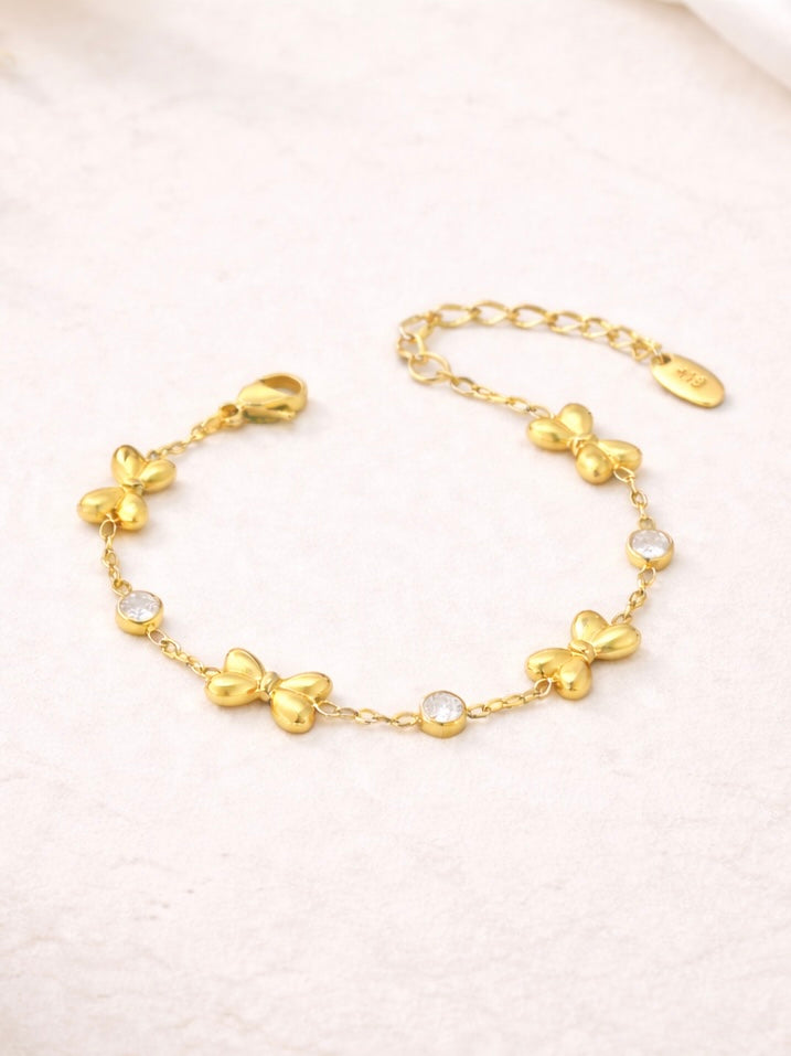 armbandje kind gouden strik